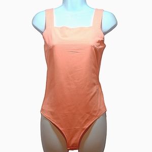 Reoria Bodysuit Like New Peach Color Size M Like New. Excellent condition.